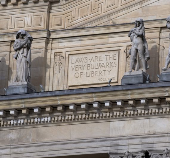 A close-up view of the Essex County Courthouse in Newark, New Jersey.  Designed by Cass Gilbert and constructed in 1907, the marble Beaux-Arts courthouse is listed on the National Register of Historic Places.  The courthouse was rededicated in 2004 after a $50 million restoration led by Farewell Mills Gatsch Architects.